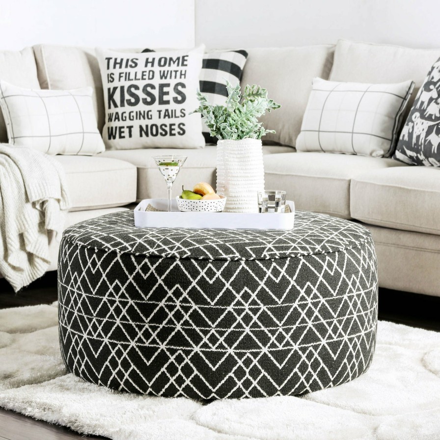 Living Room FOA East | Patricia Black/Pattern Ottoman